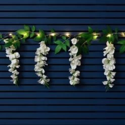 Solar Powered 180cm Artificial Leaf Garland With Wisteria Flowers - Warm White -Magic Garden 379258 180cm solar powered artificial leaf garland with wisteria flowers 20 warm white micro leds 3