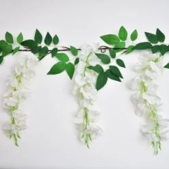 Solar Powered 180cm Artificial Leaf Garland With Wisteria Flowers - Warm White -Magic Garden 379258 180cm solar powered artificial leaf garland with wisteria flowers 20 warm white micro leds 4
