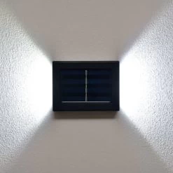 Solar Powered Up/Down Wall Light - White LED 4pk -Magic Garden 379453 4pk solar powered up down wall light cool white leds 4